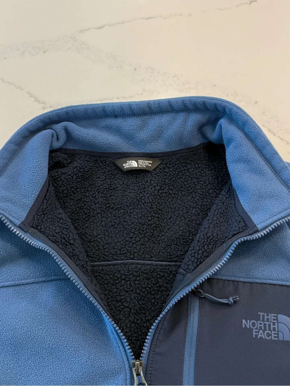 The North Face Blue Men’s Fleece Vest with Navy Chest Panel